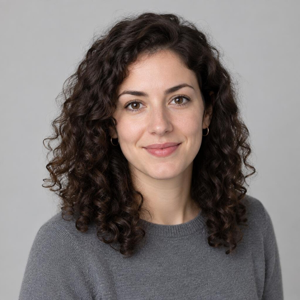 Studio portrait of a Swiss woman data reporter in her late twenties