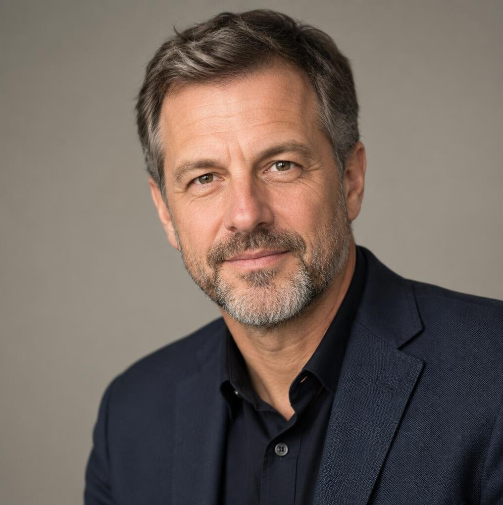 Studio portrait of a Swiss man editor in his fifties